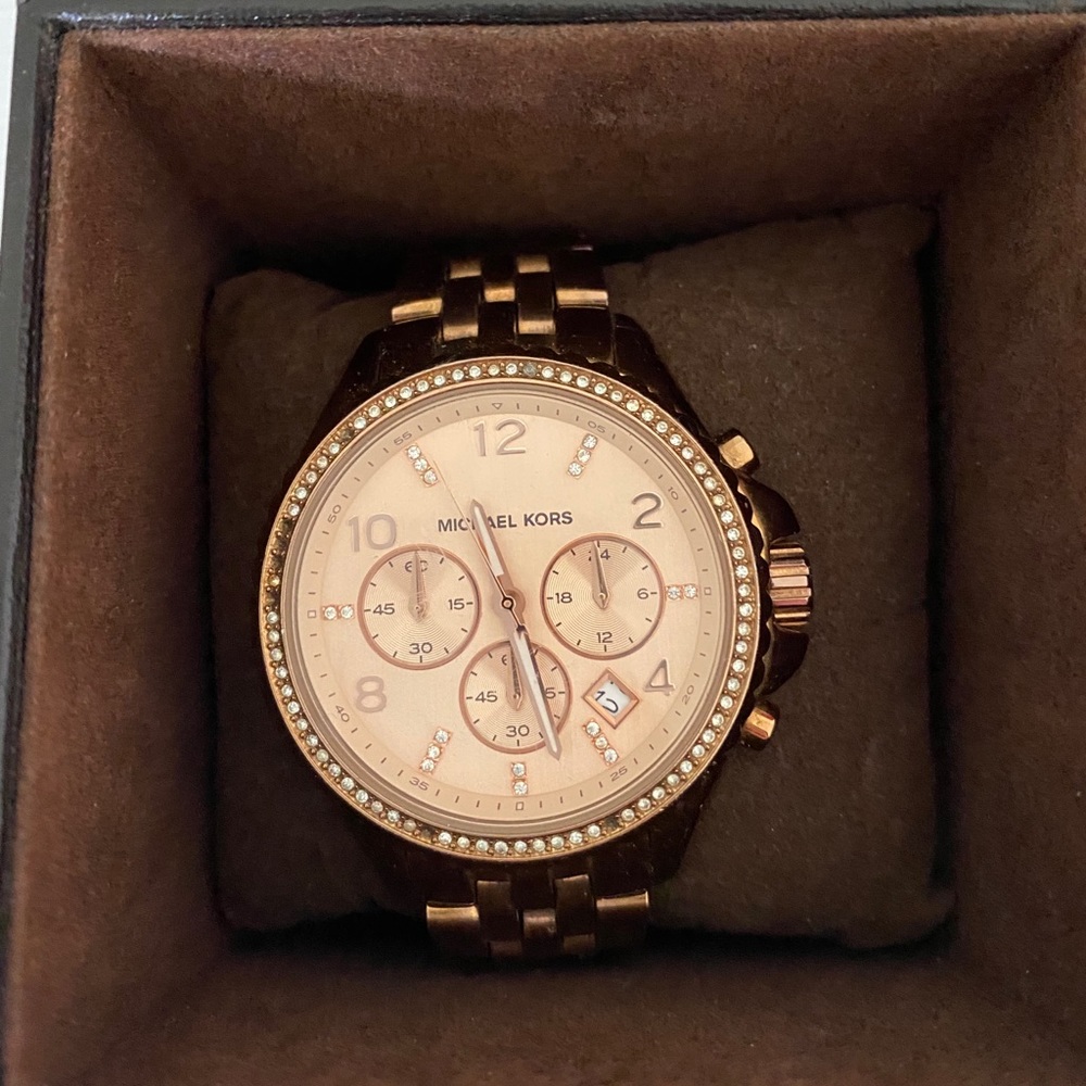 Michael kors rose gold watch.